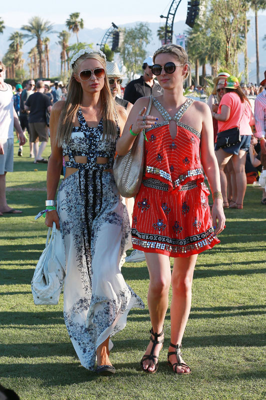 Paris and Nicky Hilton share a laugh at Coachella